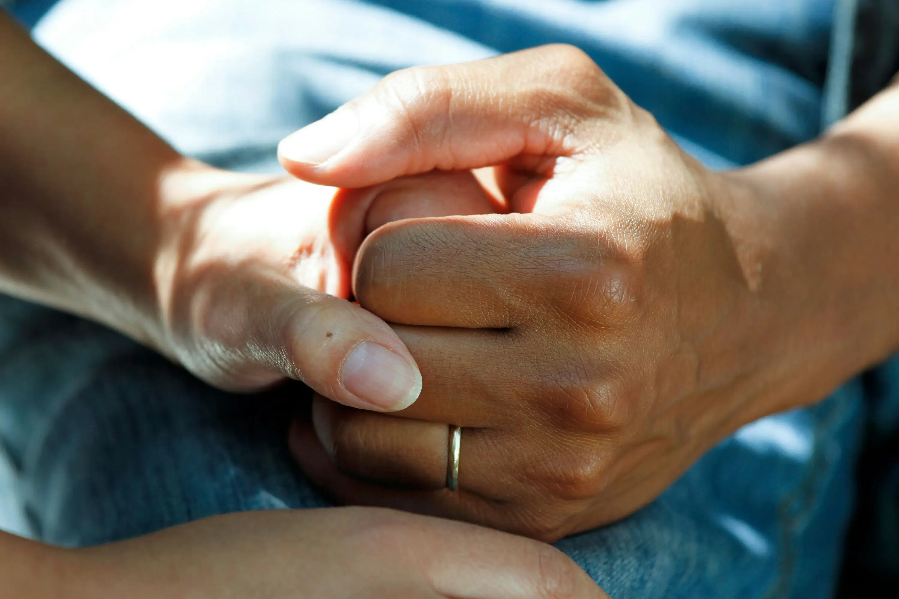 Doctor holding patient's hand